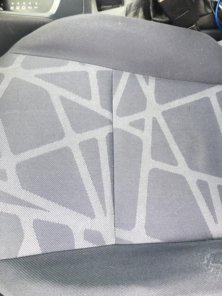 Car seat after cleaning β pattern restored, stains gone